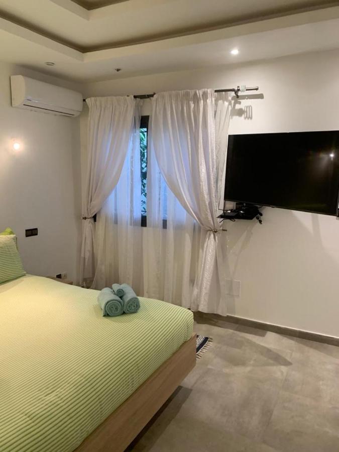 Luxury Suites Chester One Dakar Bagian luar foto
